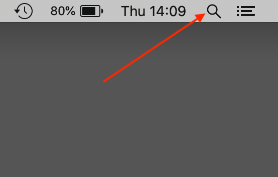 The Spotlight magnifying glass icon in the menu bar on the right.